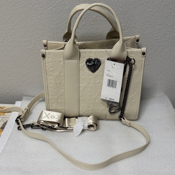 Betsey Johnson Handbags - ✨ Betsey Johnson Cream Crossbody Bag | Heart & Skull Accent Purse